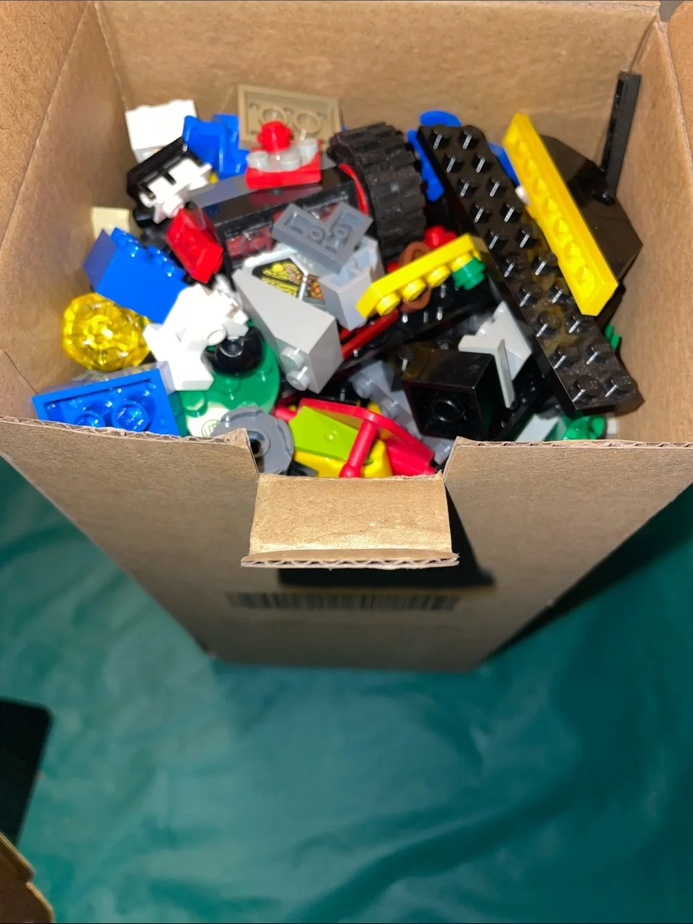Lego Mixed Brick Lot with Blue, Red, Yellow, Black Pieces-10”x5” box full